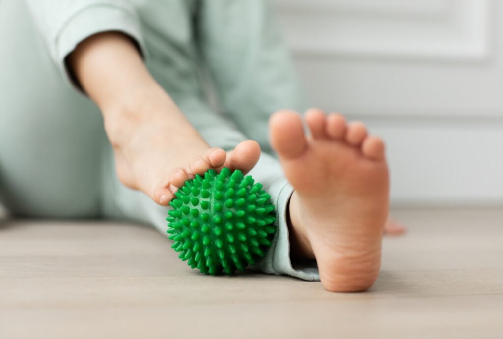 kid holding massage ball physical therapy and massage for development neuro psychology kid holding massage ball physical therapy and massage for development neuro psychology